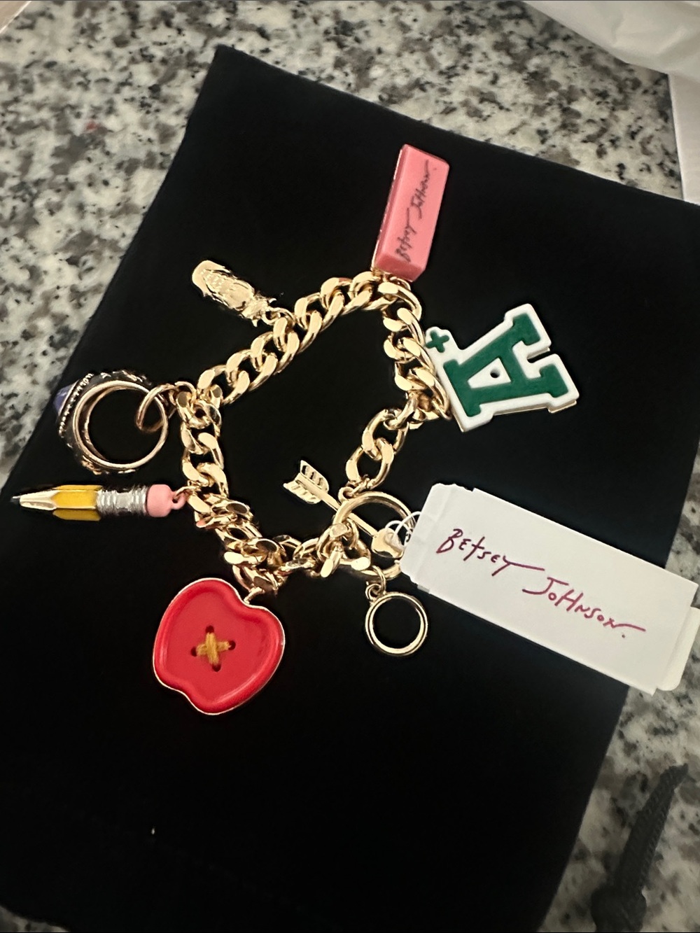 Betsey Johnson Gold Charm Bracelet with Red, Pink & Green Accents